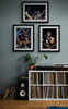 Bruce Springsteen #2 | Classic Rock Photo | Limited Edition Print by Jeffrey Mayer framed in black alongside another classic Bruce Springsteen photo displayed in a music room setting.