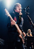 Paul McCartney by Jeffrey Mayer | Classic Rock Photo | Paul McCartney on stage with a guitar.