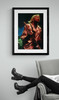 Nirvana Photo framed in black near arm chair