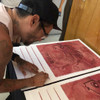 Jose Pasillas Signs His Commemorative Print