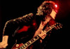 Jimmy Page sprints across the stage at the Forum in 1972