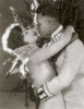 Greta Garbo and John Gilbert in a romantic embrace by Ruth Harriet Louise, Love, 1927