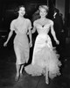 Publicity still of Lana Turner showing Ava Gardner around the set of THE MERRY WIDOW, a musical starring Lana and Fernando Lamas.