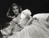 Elegant shot of Vivien Leigh in a white taffeta gown by the acclaimed photographer Laszlo Willinger.
