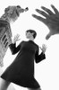 fashion model poses at Statue of Liberty
