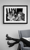 Lynyrd Skynyrd by Richard E. Aaron | Classic Rock Photo | Limited Edition Print |  1976, in New York. Backstage candid photo with monkey. Framed in black and displayed by reading chair.