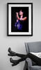 Linda Ronstadt #7 by Richard E. Aaron | Classic Rock Photo | Limited Edition Print  | Framed in black and displayed by a reading chair.