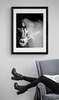 Prince #9 by Richard E. Aaron | 1985 Purple Rain Tour | Classic Rock Photo | Limited Edition Print | Framed in black by a reading chair.