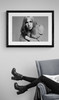 Tom Petty #6 Photo by Richard E. Aaron : Classic Rock Photo | Limited Edition Print | 1976 | head shot | Framed in black and displayed near a reading chair.