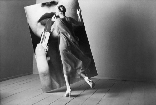 Fashion model having fun with Lipstick