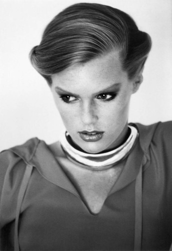 1970\'s fashion shoot with model with focused pose
