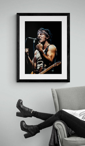 Bruce Springsteen #3 | Classic Rock Photo | Limited Edition Print by Jeffrey Mayer. Displayed framed in black  by a reading chair.