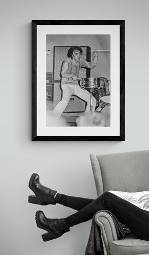 The Who #6 | Keith Moon Photo by Jeffrey Mayer framed in black by reading chair