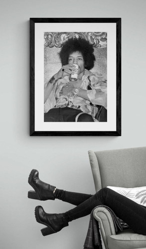 Jimi Hendrix #1 by Jeffrey Mayer framed photo by arm chair