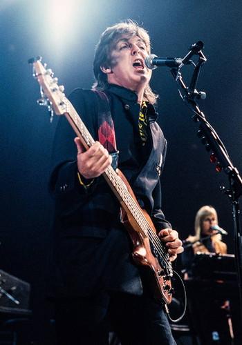 Paul McCartney by Jeffrey Mayer | Classic Rock Photo | Paul McCartney on stage with a guitar.