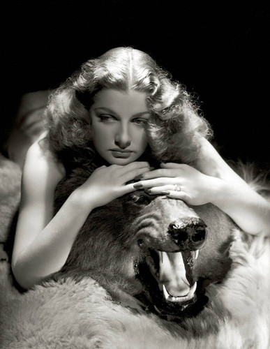 Ann Sheridan on Bear rug by George Hurrell.