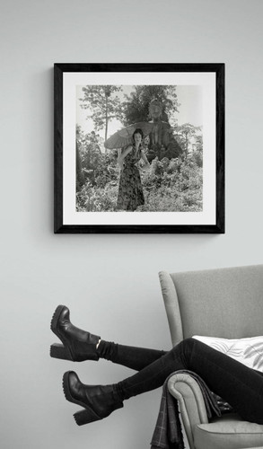 Garden Of Buddhas framed by arm chair by Gleb Derujinsky