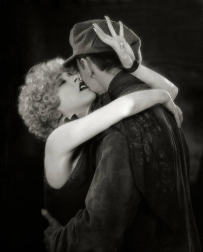 Mae and Murray in a romantic embrace in Masked Bride, 1925.