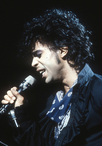 Photograph of Prince by Jeffrey Mayer in concert from 1983.