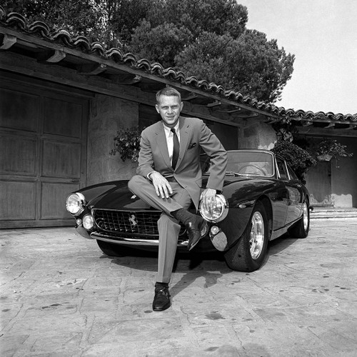 Steve McQueen with his 1963 Ferrari Lusso at his home in Malibu.  Photo by Garry Watson in 1966. Limited Edition of 100.