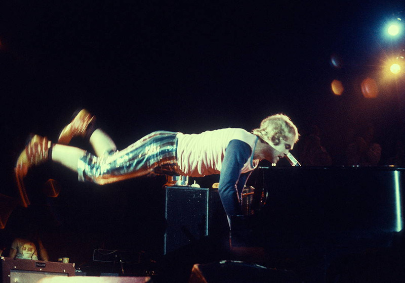 Elton John #1 by Jeffrey Mayer | Classic Rock Photo | Limited Edition Print. Elton John levitating above his piano
