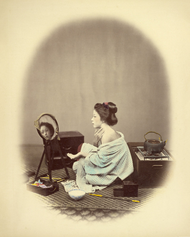 Woman Using Cosmetics by Felice Beato