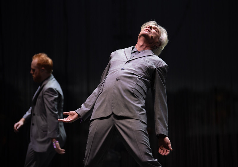 Photograph of David Byrne performing 'American Utopia' at the Coachella Music Festival.