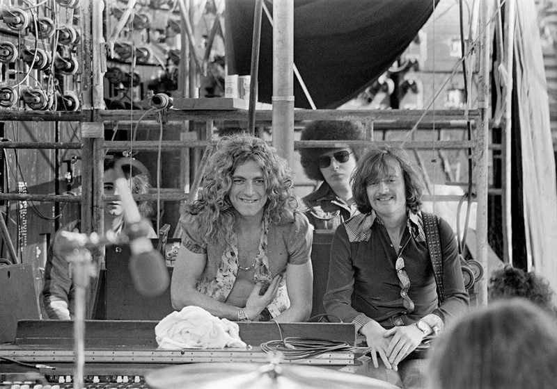 Robert Page and John Paul Jones watching Bonham\'s drum solo from behind the speaker stack at Kezar Stadium in 1973