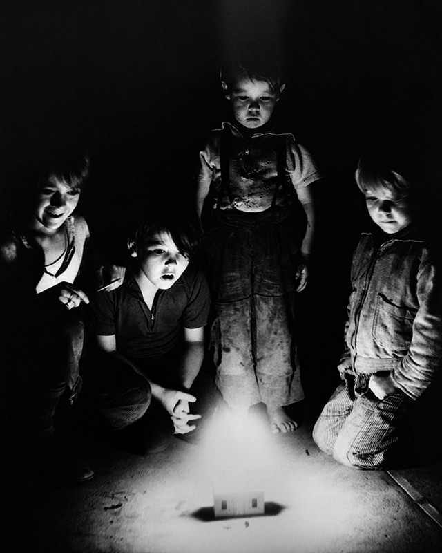 Watson Brothers watching the popular “House Afire” firework.