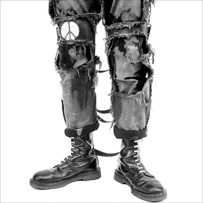 Punk rock fan wearing peace pants outside CBGB in 1983, from the Matinee portrait collection by Drew Carolan