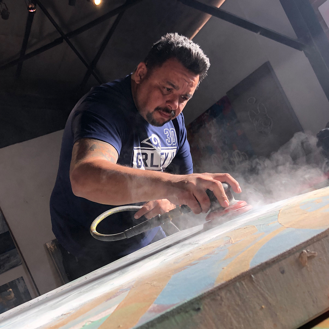 Karlos Marquez woriging on anew Abstract poece at his studio.