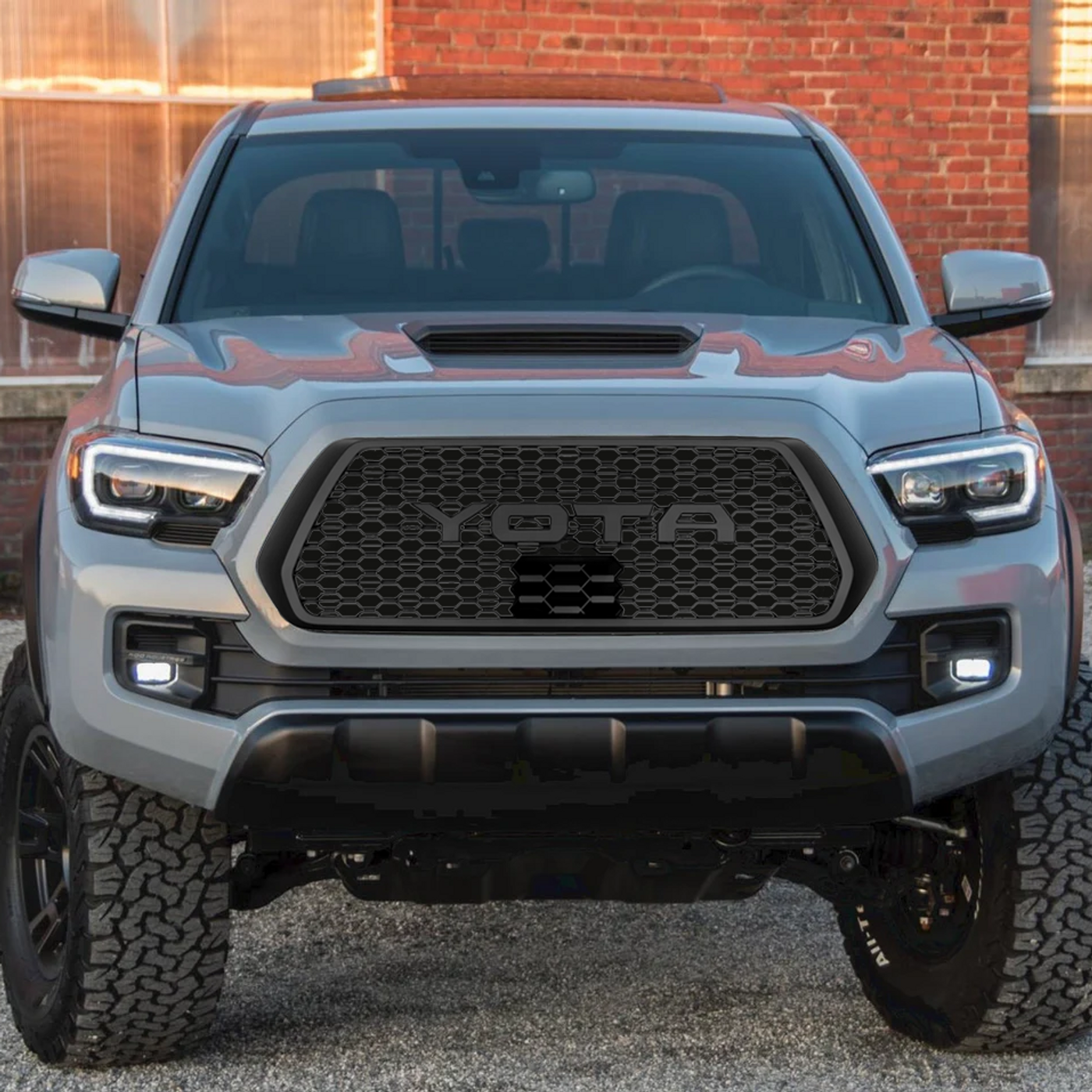 Image of Honeycomb Toyota Grille with Raptor Lights for 3rd Gen Toyota Tacoma (2016+).