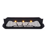 Image of HONEYCOMB MESH GRILLE WITH AMBER LED LIGHTS.