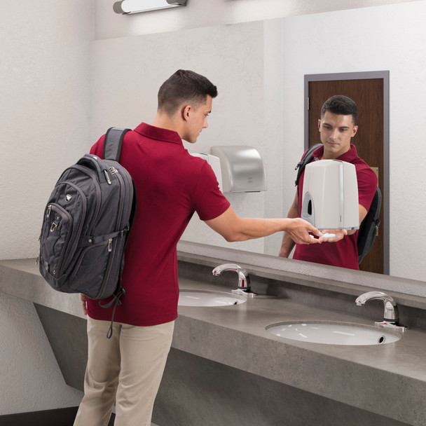 Man in Burgundy T-shirt Uses 800ml Rubbermaid Unbranded Manual Foam Soap Dispenser in Washroom