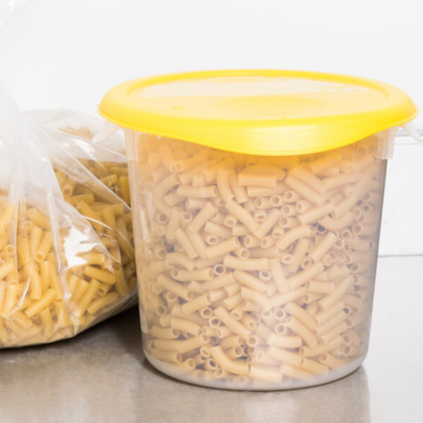 Container Placed on Worktop, Fitted with a Yellow Lid and Filled with Pasta