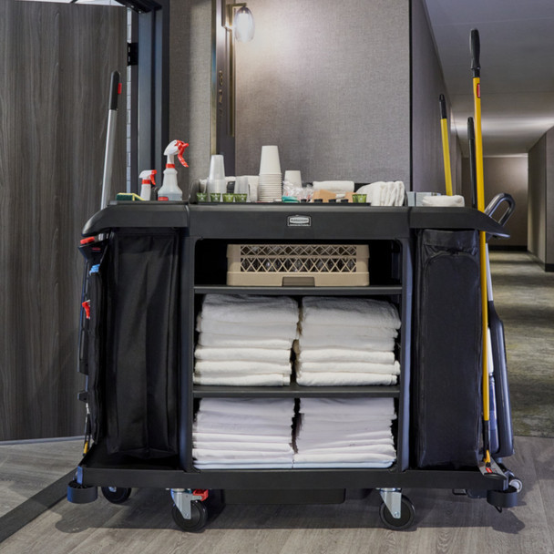 Rubbermaid Side-Load Linen Bag Fitted to Fully Loaded Housekeeping Cart in Hotel Corridor