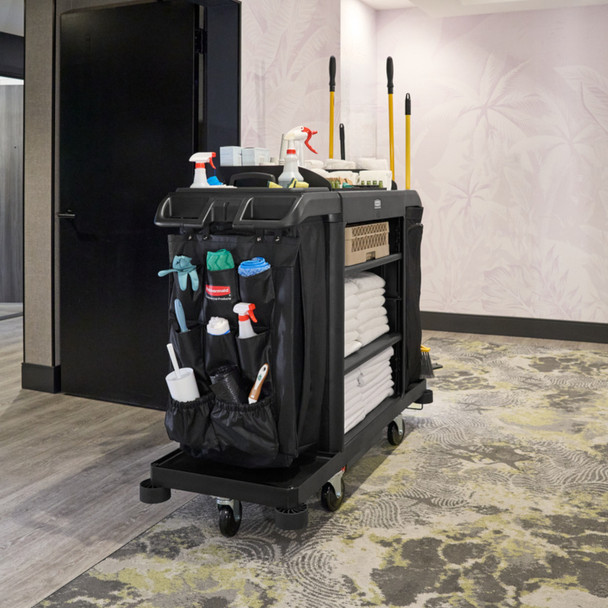 Rubbermaid 9-Pocket Organiser Attached to Housekeeping Cart Situated in Hotel Corridor