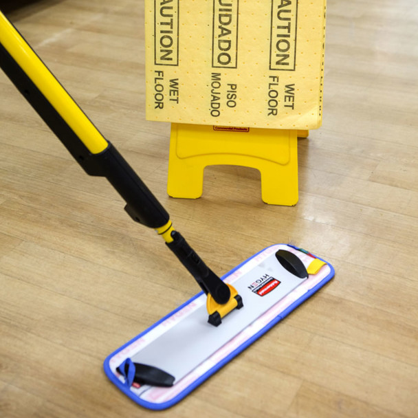 Rubbermaid HYGEN PULSE Mop Being Used to Clean Floor in Front of Safety Sign Rubbermaid HYGEN PULSE Mop Being Used to Clean Floor in Front of Safety Sign