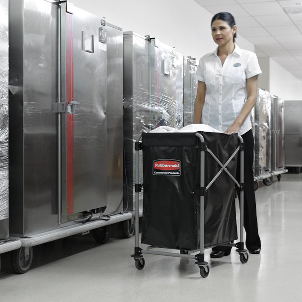 Cleaner Uses 150 Ltr X-Cart Frame Fitted with Vinyl Bag to Transport Dirty Linen