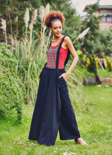 Black Jumpsuit with Pockets, Skirt, and Mixed Patterns at the Front