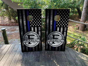 Custom Thin Blue Line cornhole boards featuring a distressed American flag background, bold blue stripe, and personalized monogram with a last name. Perfect for law enforcement appreciation, police officer gifts, and patriotic events Custom Thin Blue Line cornhole boards featuring a distressed American flag background, bold blue stripe, and personalized monogram with a last name. Perfect for law enforcement appreciation, police officer gifts, and patriotic events