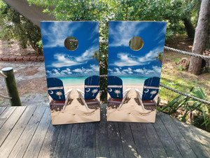 South Carolina Beach Chair. On the sandy beach in front of a blue ocean. South Carolina Beach Chair. On the sandy beach in front of a blue ocean.