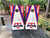 Custom sports team cornhole boards featuring a bold red, white, and blue design with a customizable team logo and text. Perfect for tailgates, game days, and sports fans