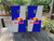 Custom cornhole wraps featuring the iconic Red Bull logo on a bold blue and gray background, perfect for fans of the energy drink and unique cornhole designs