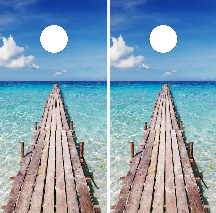 Beachy cornhole wraps, deck walking out to turquoise tropical blue water. Calm ocean scene