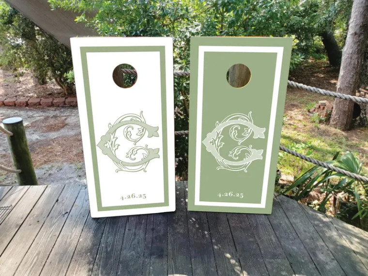 Olive green and ivory wedding cornhole board wraps featuring a refined double-line border and elegant vintage monogram “W” in the center. A minimalist yet timeless design that adds a sophisticated touch to outdoor weddings, garden receptions, and anniversary celebrations.