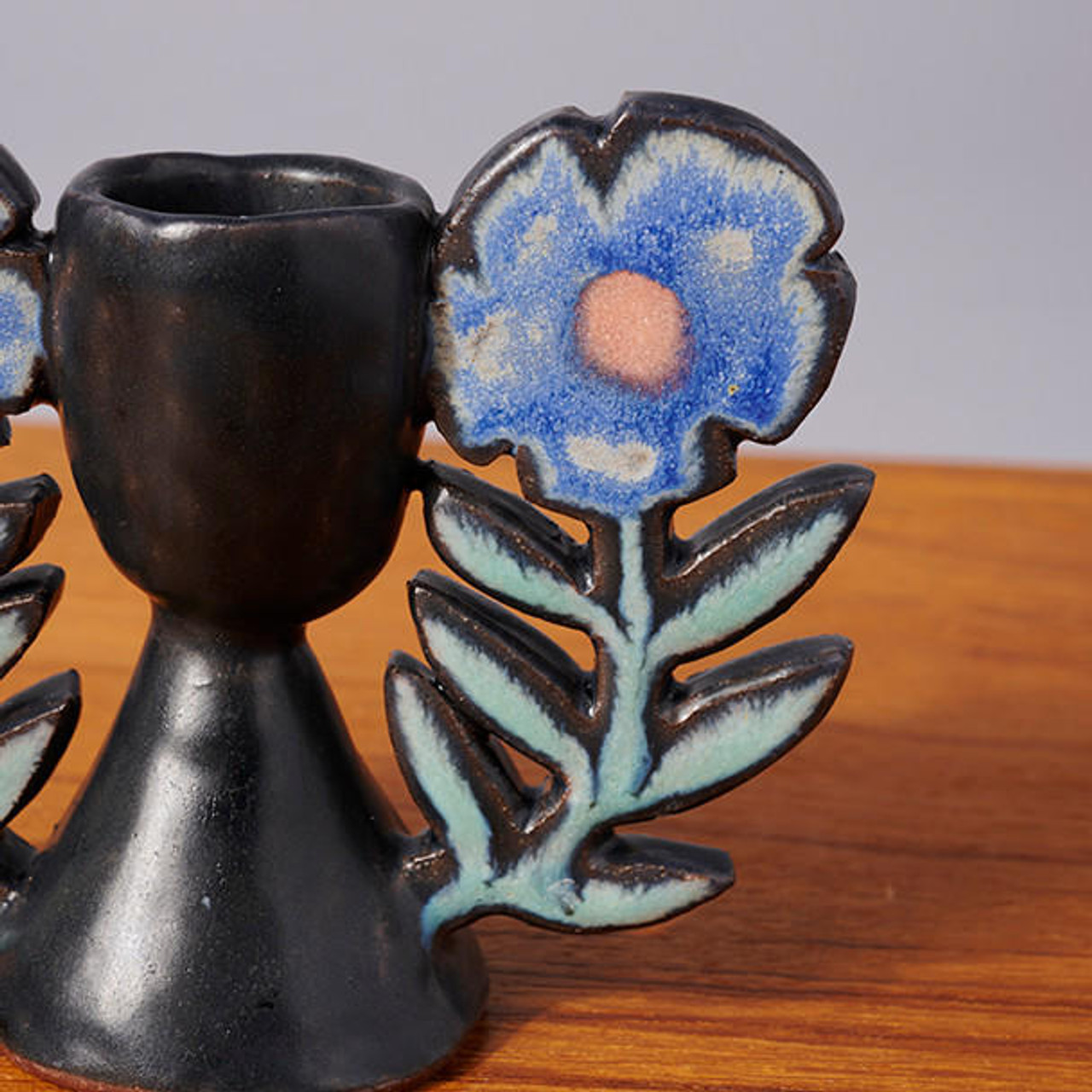 https://cdn11.bigcommerce.com/s-3rl2qg0z2p/images/stencil/1280x1280/products/13226/38593/ruth-easterbrook-floral-candleholder-by-ruth-easterbrook__68172.1675472644.jpg?c=1?imbypass=on