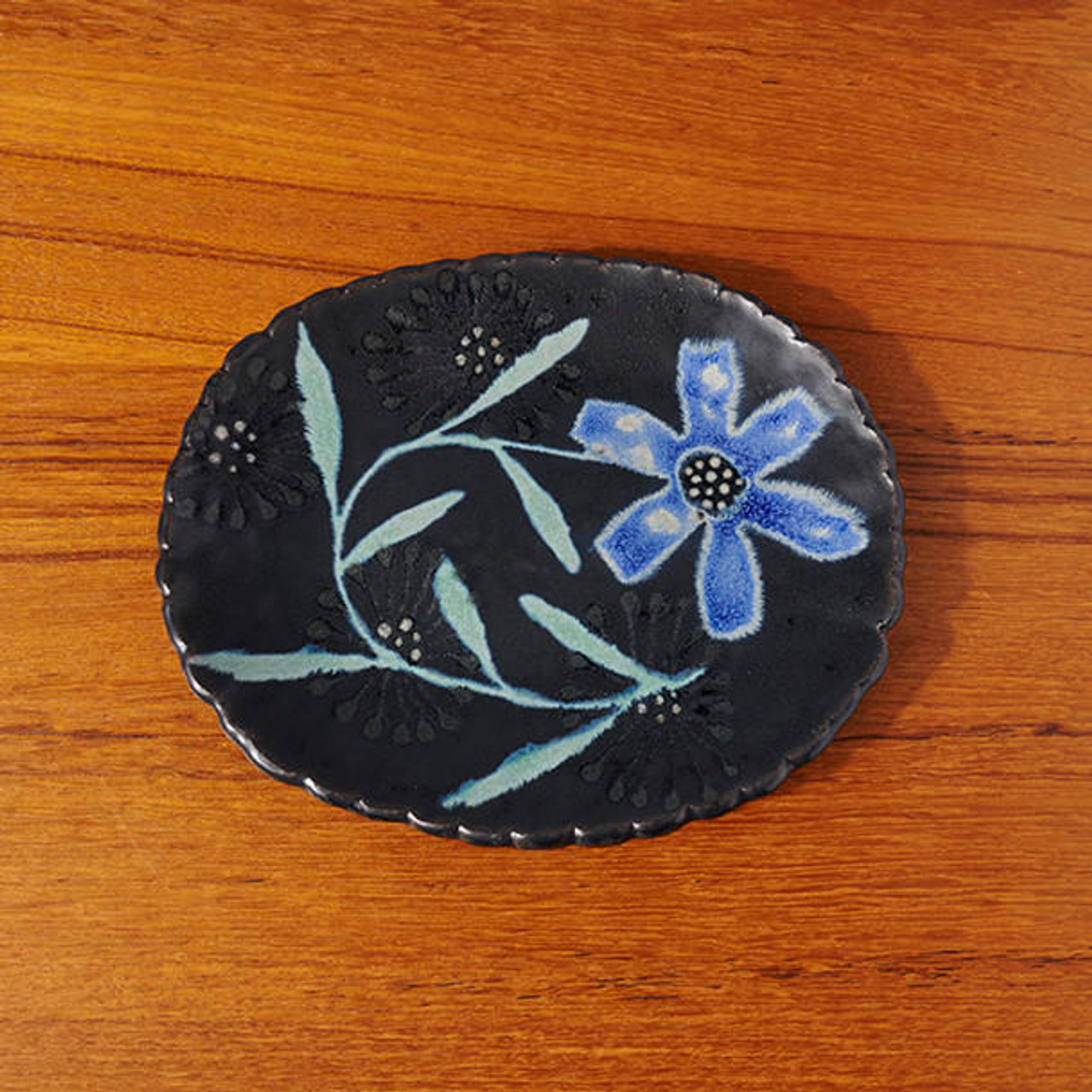 https://cdn11.bigcommerce.com/s-3rl2qg0z2p/images/stencil/1280x1280/products/13227/38178/ruth-easterbrook-blue-flower-lunch-plate-by-ruth-easterbrook__90142.1675471952.jpg?c=1