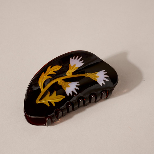 Dark brown with small lavender flowers printed on semi circle shaped hair claw