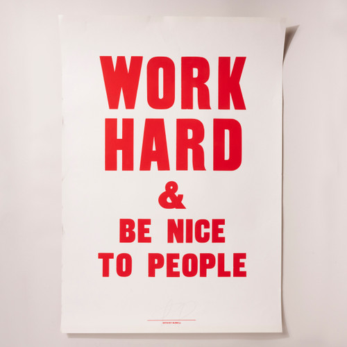 A full view of this screenprint shows the message "WORK HARD & BE NICE TO PEOPLE". The type is bright red on a white background. The letters are all upper case, and the words "WORK HARD" are larger and sit above the remaining two lines of the message, those in a smaller font. The "AND" appears as an ampersand.